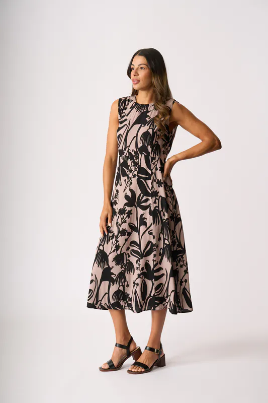 Model wearing Shadow Frond Panel Flare Dress By Foil Available at Beetees Nelson