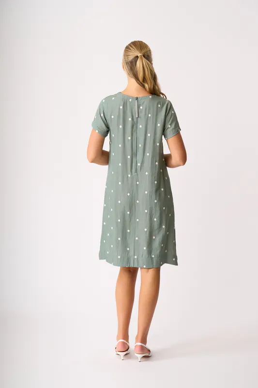 Model wearing Sage Spot On A Line Dress By Oh Three Available at Beetees Nelson