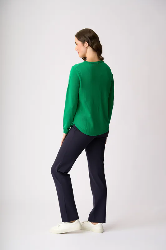 Model wearing Floral Green Scoop Up Jumper By Memo Available at Beetees Nelson