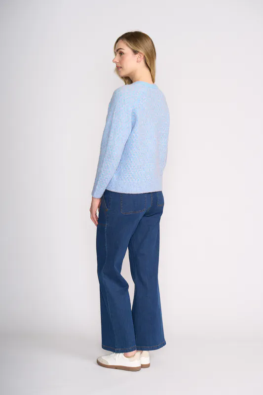 Model wearing Blue Honeycomb Sweetest Thing Sweater By Foil Available at Beetees Nelson