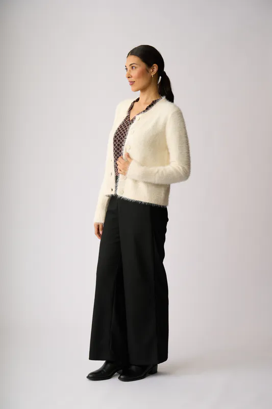 Model wearing Vanilla Fluffy Scoop Cardigan By Foil Available at Beetees Nelson