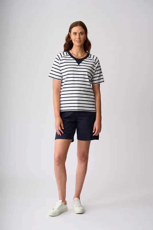 Model wearing White Navy Stripe St James Top By Charlie Jane Available at Beetees Nelson