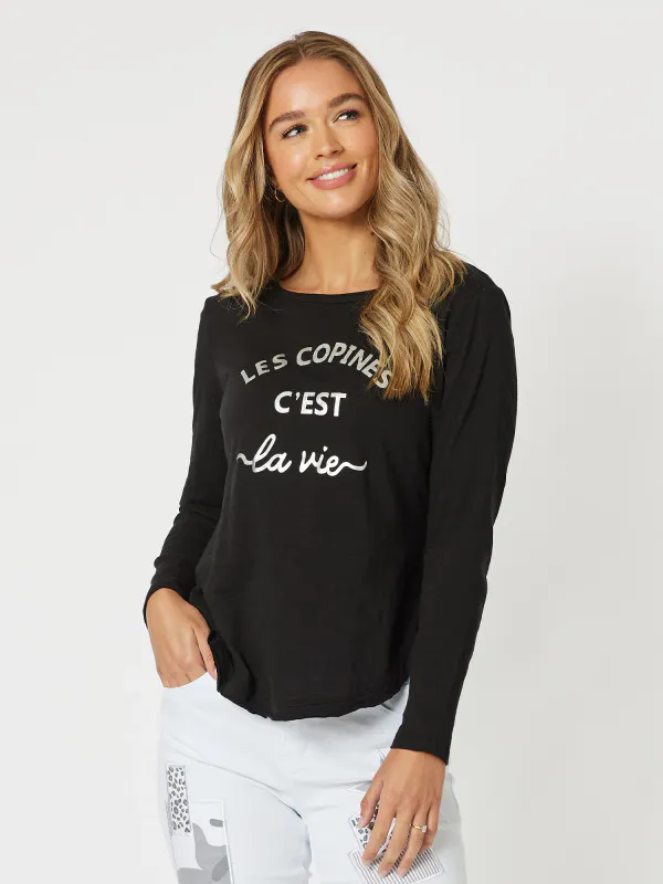 Model wearing Black Coloured Les Copines Long Sleeve T-Shirt By Threadz Available at Beetees Nelson
