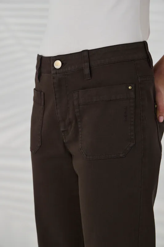 Model wearing Cocoa Chrome Jean By Lania Available at Beetees Nelson