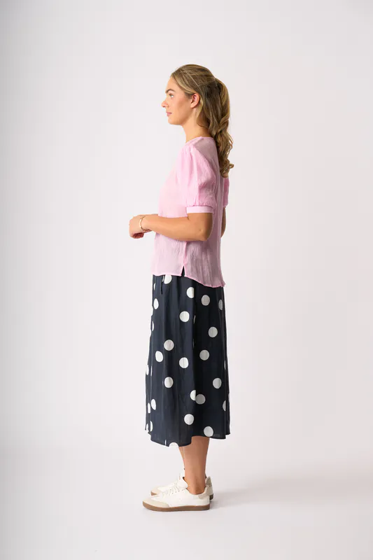 Model wearing Candy Top - Volume Sleeve, Scoop Hem By OH Three Available at Beetees Nelson