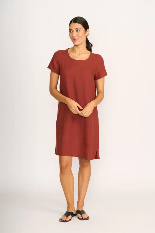 Model wearing Spice Dress - Panel Lines By Foil Available at Beetees Nelson