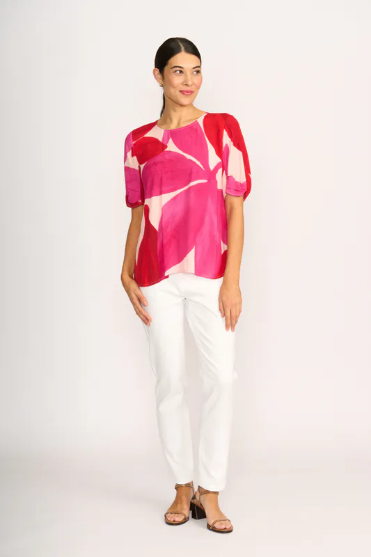 Model wearing Petals Podium Top By Foil Available at Beetees Nelson