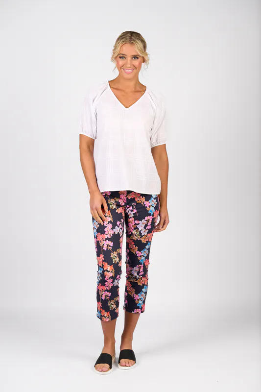 Model wearing White Check Plain V Neck Top with Floaty Sleeve By Vassalli Available at Beetees Nelson