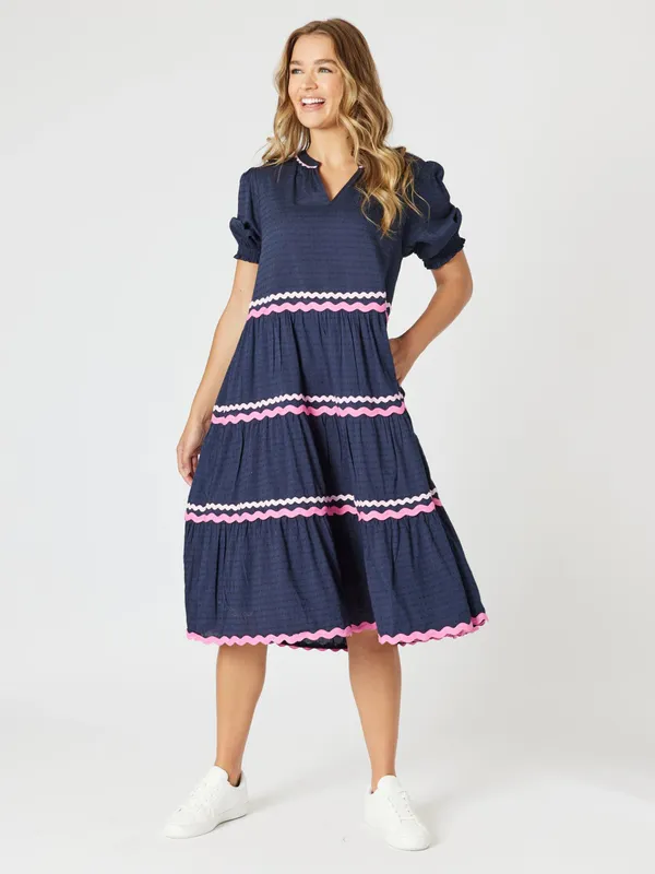 Model wearing Navy Ric Rac Dress By Threadz Available at Beetees Nelson