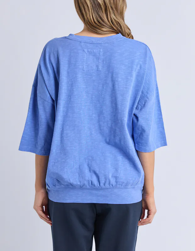 Model wearing Blue Maize Sweat By Elm Available at Beetees Nelson