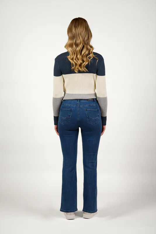 Model wearing Blue Wash Potter Jean By Knewe Available at Beetees Nelson