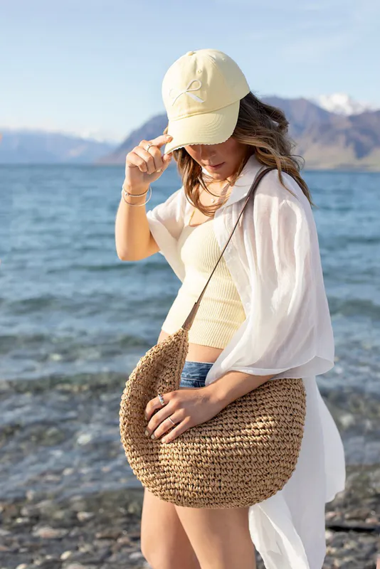 Model wearing Seaside Sling Bag By Antler NZ Available at Beetees Nelson