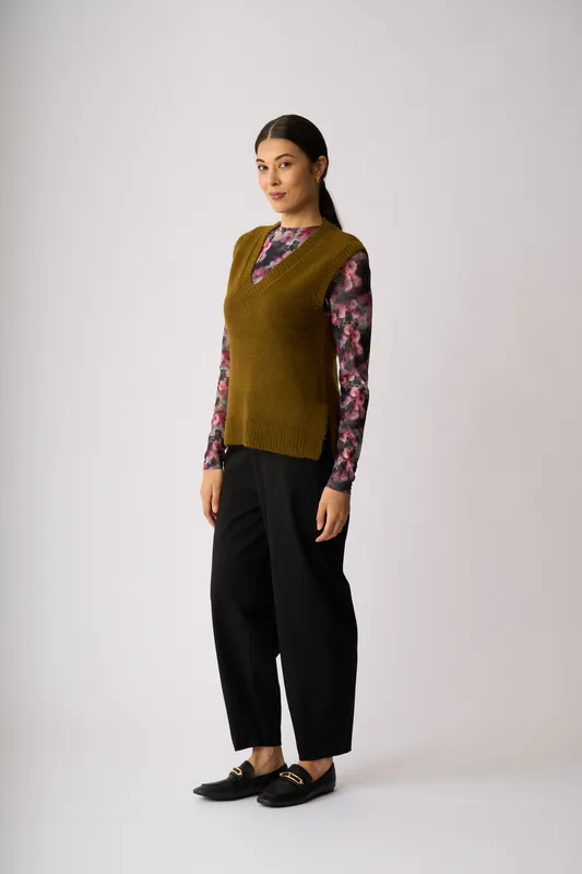 Model wearing Chatreuse Pop Star Vest By Memo Available at Beetees Nelson