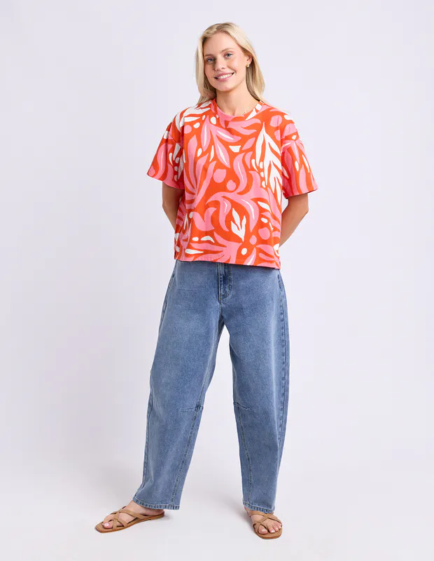 Model wearing Tangerine Oceana Tee By Elm Available at Beetees Nelson