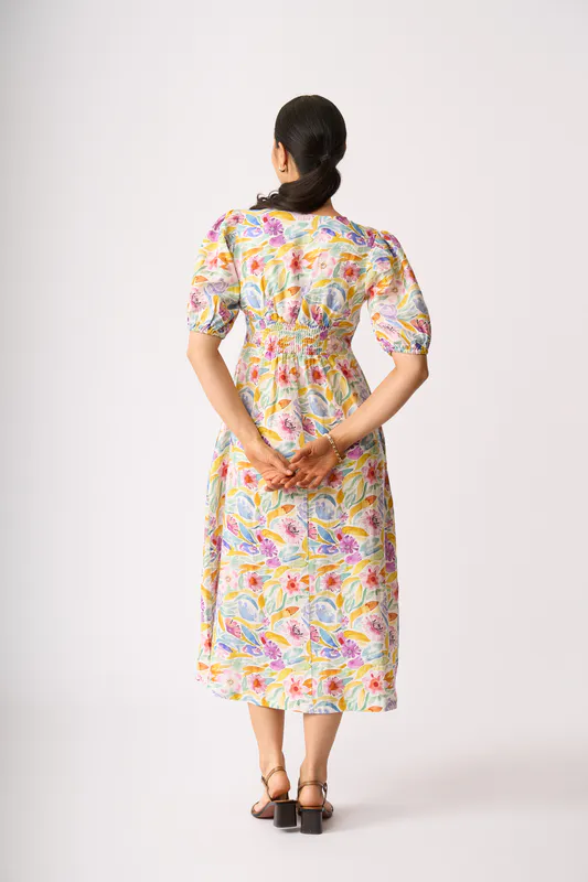 Model wearing Bright Blooms Empire-Ly Yours Dress By Foil Available at Beetees Nelson