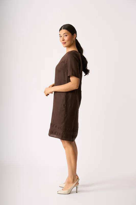 Model wearing Cocoa Crowd Pleaser Dress By Foil Available at Beetees Nelson
