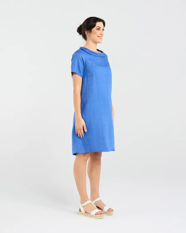 Model wearing Parisian Blue Natacha Linen Button Back Dress By Blackstone Available at Beetees Nelson