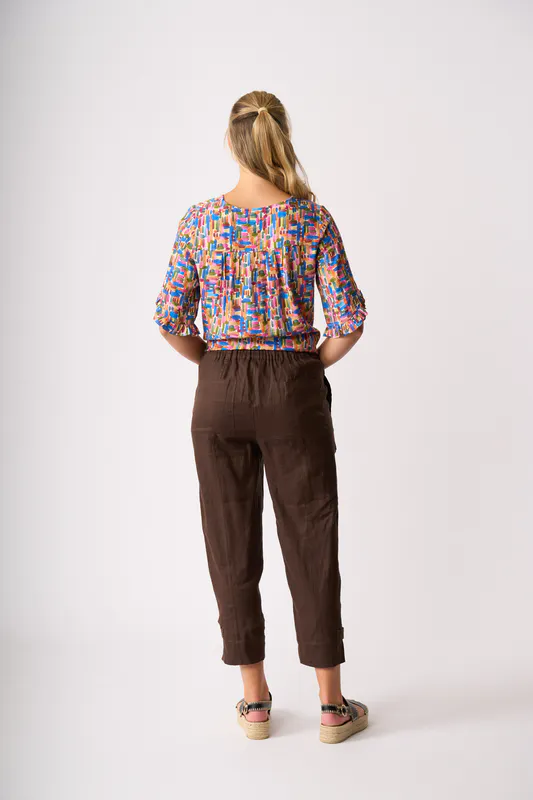 Model wearing Dashed Out Ruffle Sleeve Scoop Top By Foil Available at Beetees Nelson