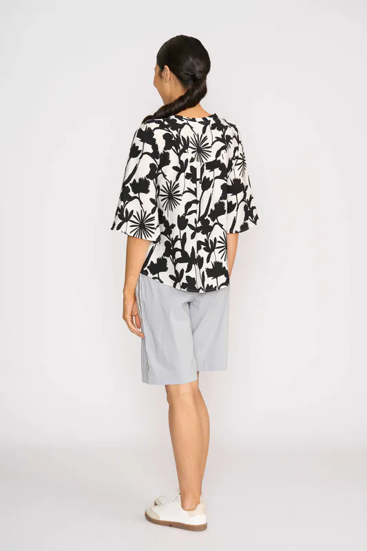 Model wearing Silhouette Floral Top - 3 Scoops By Foil Available at Beetees Nelson