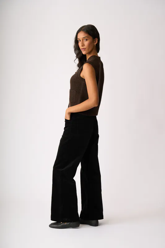 Model wearing Chocolate Cable Knit Detail Cardigan By Foil Available at Beetees Nelson