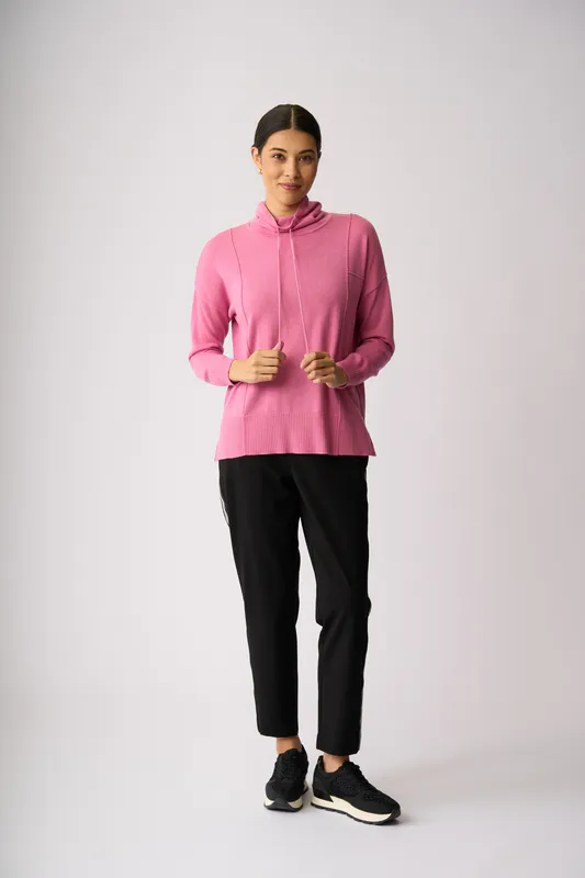 Model wearing Pink Reverse Seam Jumper By Foil Available at Beetees Nelson