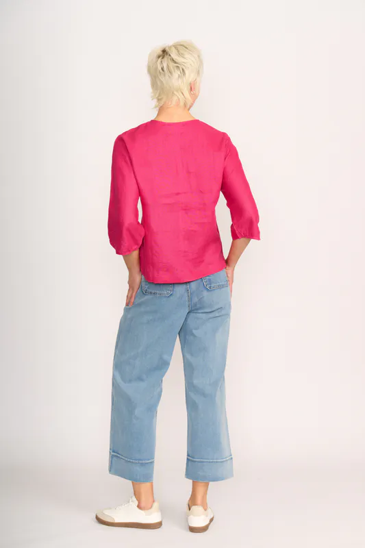 Model wearing Pink Plot Twist Top By Foil Available at Beetees Nelson