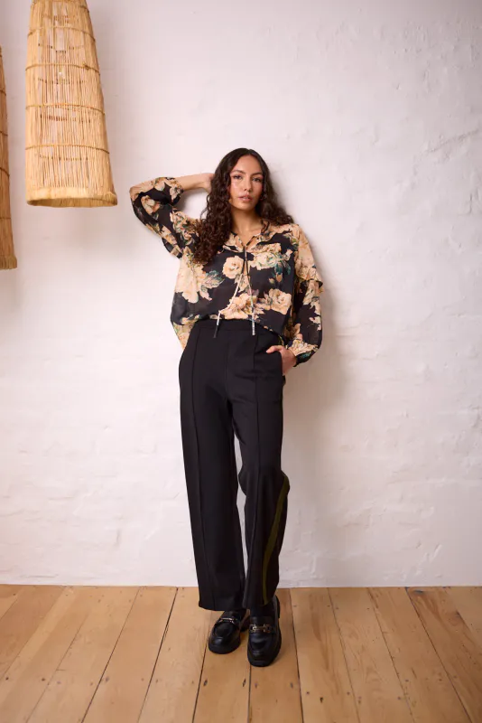 Model wearing Black Olive Batten Pant By Navy & No. Available at Beetees Nelson