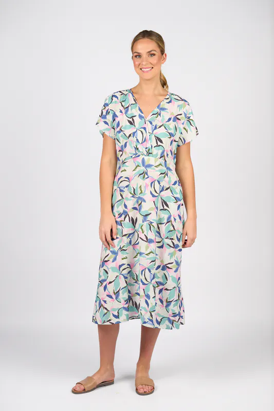 Model wearing Soleil Drop Shoulder Dress with Wrap Bodice and Side Pockets By Vassalli Available at Beetees Nelson