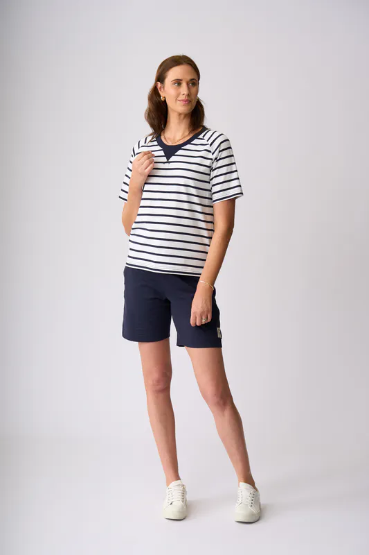 Model wearing White Navy Stripe St James Top By Charlie Jane Available at Beetees Nelson