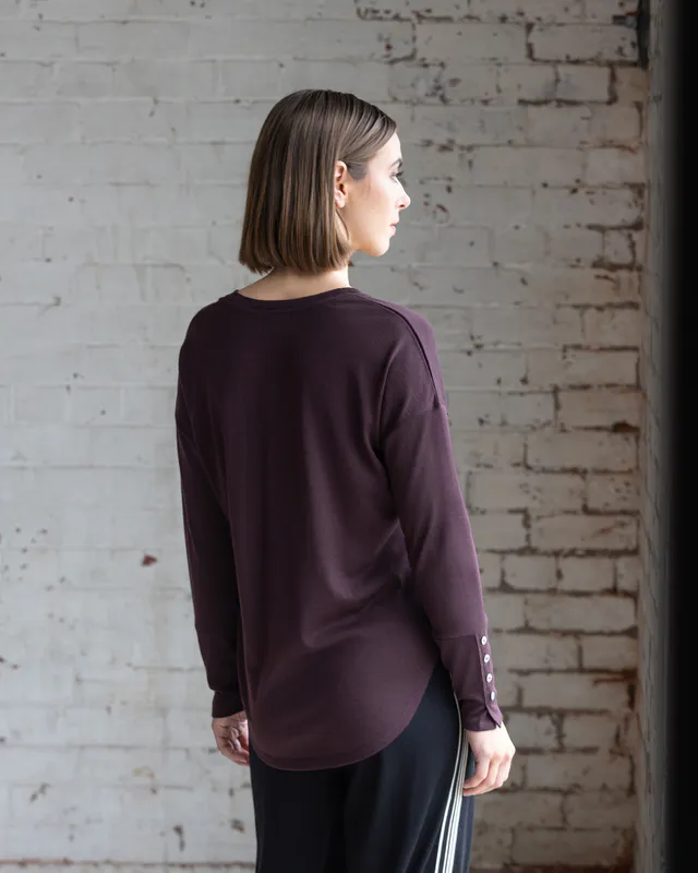 Model wearing Dragonfly Veni Merino Top By Vassalli Available at Beetees Nelson