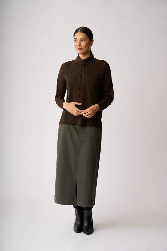 Model wearing Black Reverse Seam Jumper By Foil Available at Beetees Nelson