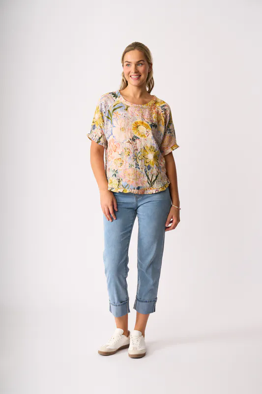 Model wearing Peonies Ruffles & Scoop Hem Top By Foil Available at Beetees Nelson