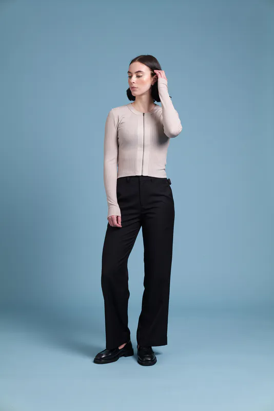 Model wearing Black Coloured Buckle Up Pant By Siren Available at Beetees Nelson