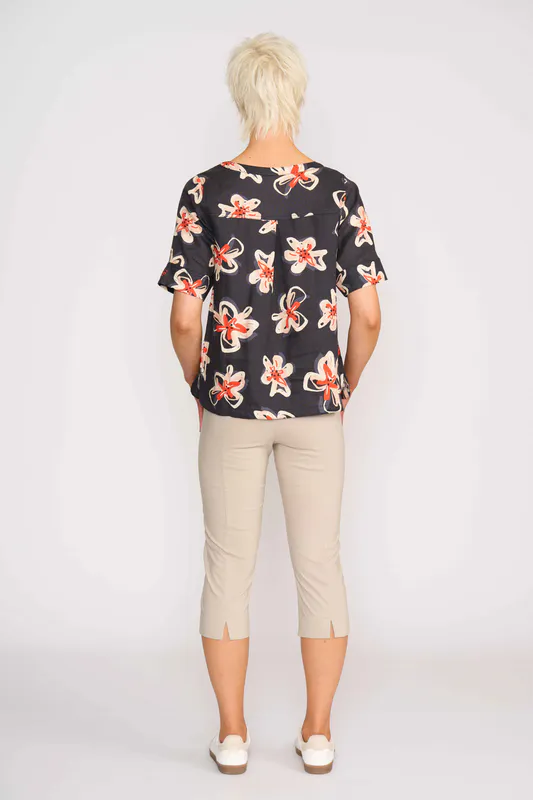 Model wearing Flower Doodle Pleat Back Top By Foil Available at Beetees Nelson