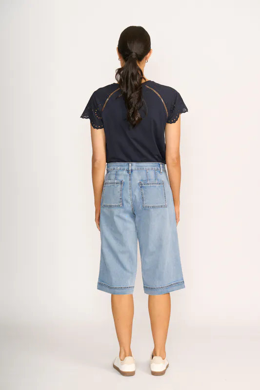 Model wearing Navy T-Shirt - Broderie Sleeve By Memo Available at Beetees Nelson