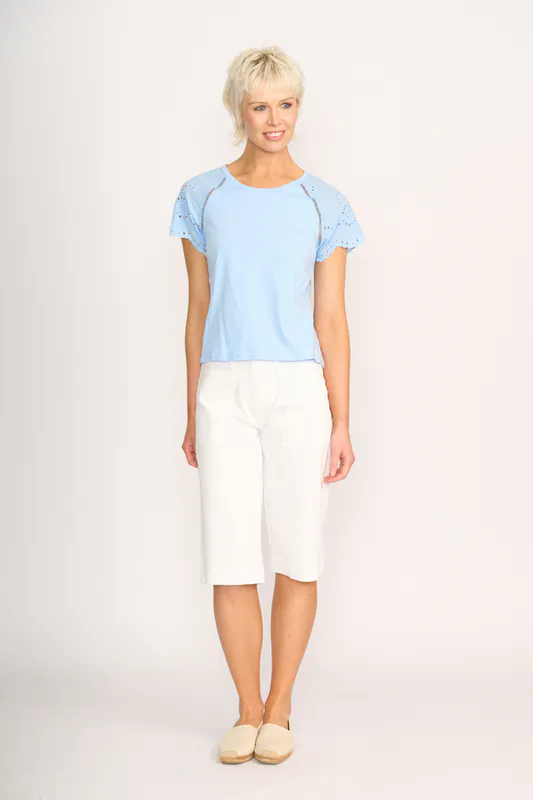 Model wearing Sky T-Shirt - Broderie Sleeve By Memo Available at Beetees Nelson