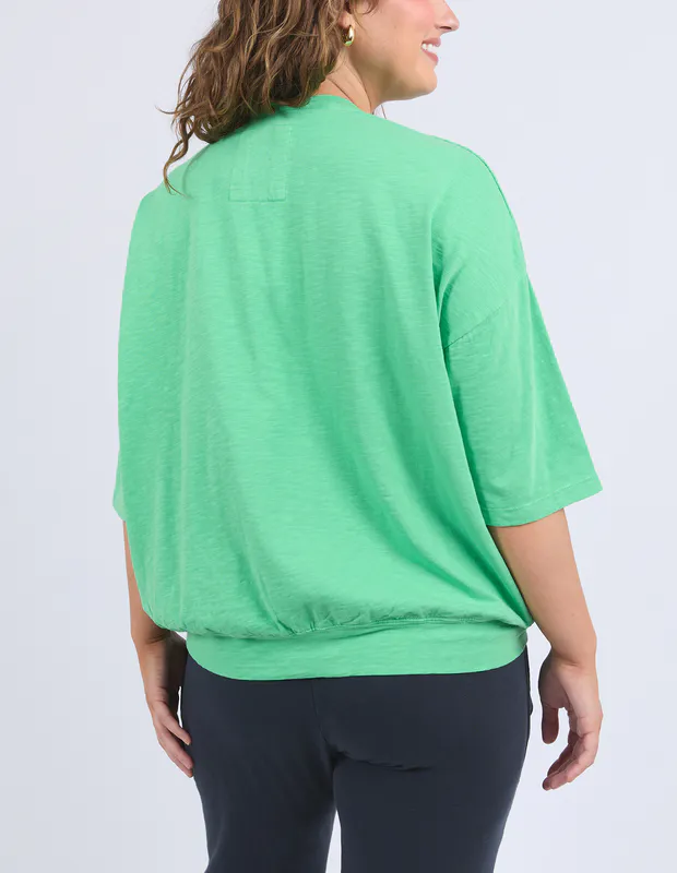 Model wearing Spring Green Maize Sweat By Elm Available at Beetees Nelson