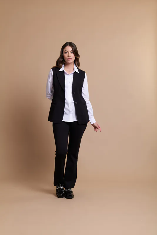 Model wearing Black Vest - Panelled, Ponti By Foil Available at Beetees Nelson
