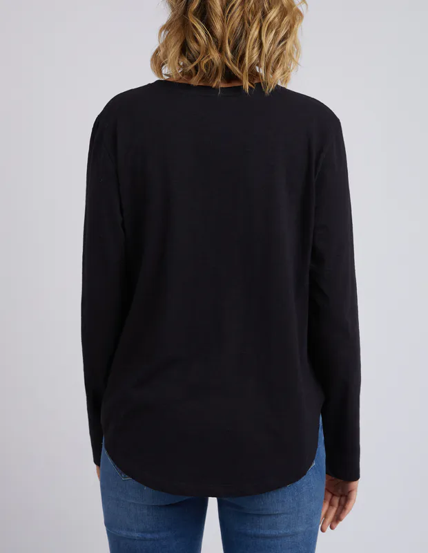 Model wearing Black Everyday Long Sleeve By Elm Available at Beetees Nelson