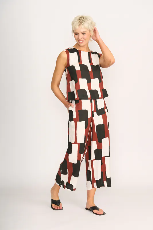 Model wearing Spice Box Top - Sleeveless, Pleat Back By Foil Available at Beetees Nelson