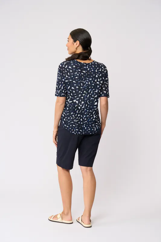 Model wearing Art Style Glow On Top By Foil Available at Beetees Nelson