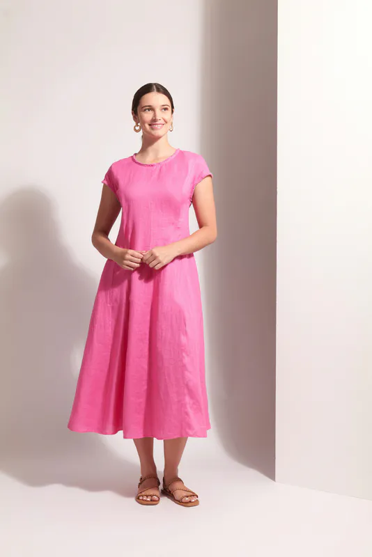 Model wearing Pink Festival Event Dress By Foil Available at Beetees Nelson