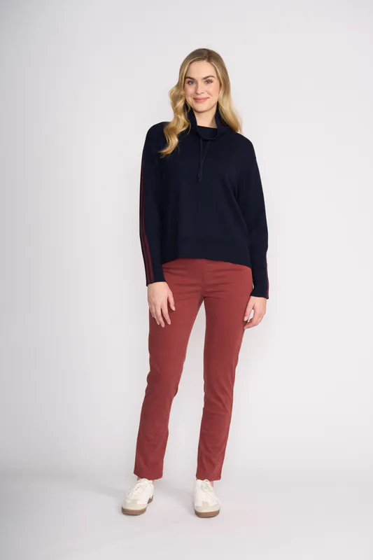 Model wearing Funnel Neck Jumper By OH Three ( Available in Cocoa Chestnut Colour Only) Available at Beetees Nelson