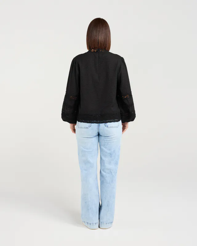 Model wearing Black Amira Top By Seduce Available at Beetees Nelson