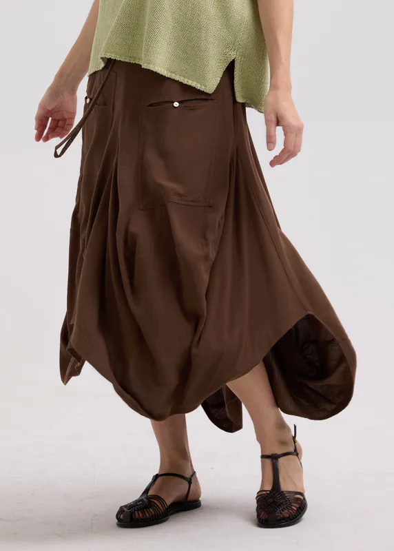 Model wearing Cocoa Drape Bottom Skirt By LD + CO Available at Beetees Nelson