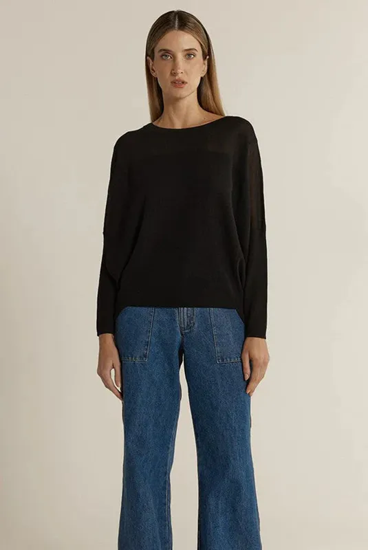 Model wearing Black Charlie Knit By Fate & Becker Available at Beetees Nelson
