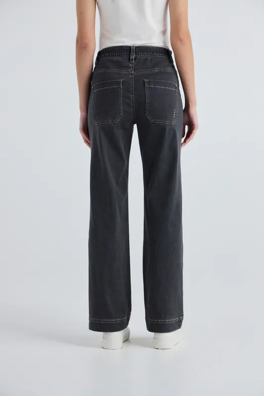 Model wearing Charcoal Chrome Jean By Lania Available at Beetees Nelson