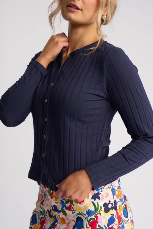 Model wearing Navy Suri Cardi By Vassalli Available at Beetees Nelson