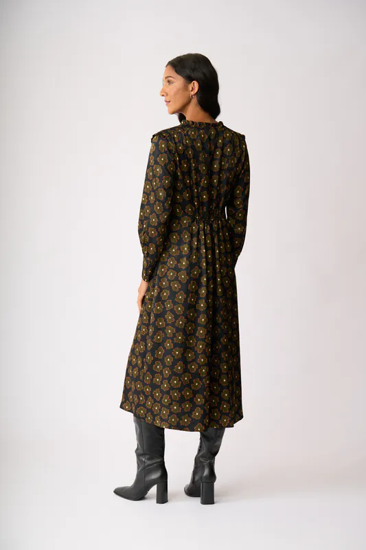 Model wearing Khaki Floral Shirred Shoulder Dress By Foil Available at Beetees Nelson