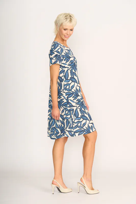 Model wearing Botany Dress - Swing Back By Foil Available at Beetees Nelson